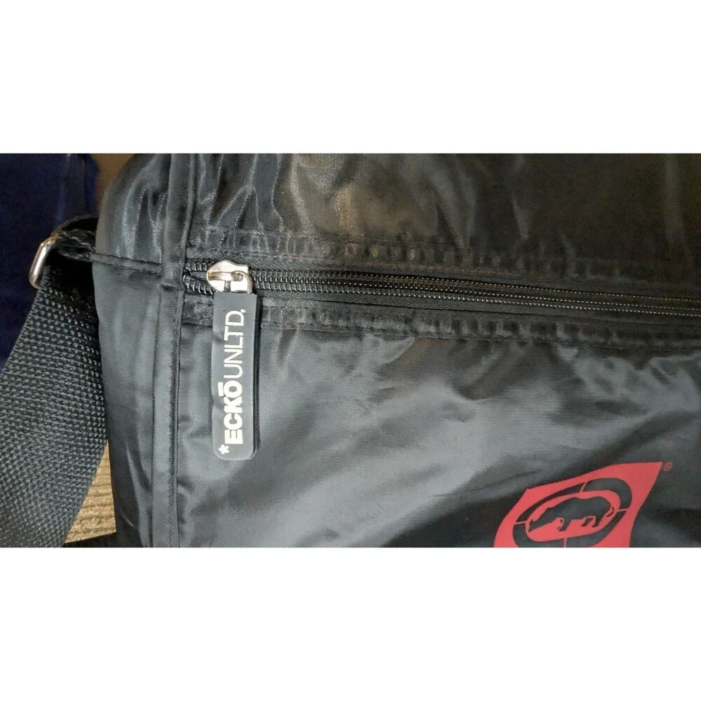 Ecko Unltd. Men’s Black/Red Messenger Bag Zip Closure Adjustable Strap Pockets
